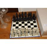 A Housemartin chess board and pieces
