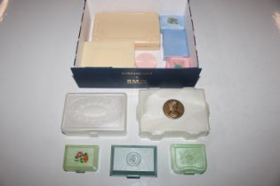 A box of vintage decorated plastic jewellery boxes