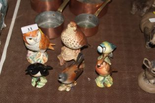 A collection of Beswick bird ornaments to include