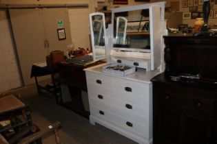 A white painted dressing chest fitted two short ov