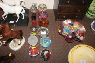 Thirteen glass paperweights to include Dartington,