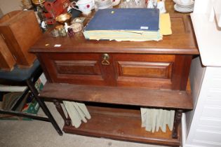 A late Victorian oak side cabinet with drop flap c