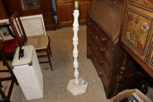 An alabaster standard lamp