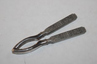 A pair of Norwegian Kongetinn nut crackers, the ha