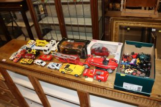 A quantity of various diecast vehicles to include Burago, matchbox, Corgi etc.