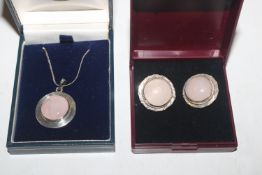 A 925 silver rose quartz set pendant hung to fine