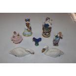 Two Beswick model swans; a pottery model of a cockerel; a Royal Doulton figurine "Mrs Bunnykins At