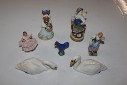 Two Beswick model swans; a pottery model of a cockerel; a Royal Doulton figurine "Mrs Bunnykins At