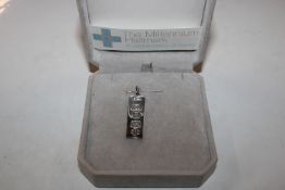 A silver ingot pendant, approx. 6.8gms