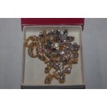 A large crystal set floral brooch