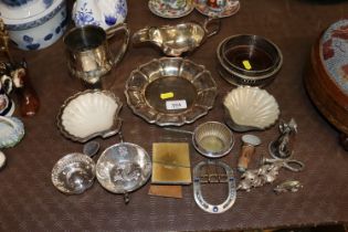 A quantity of silver platedware to include scallop