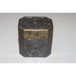 An Arts & Crafts type tea caddy with stylised pewter decoration
