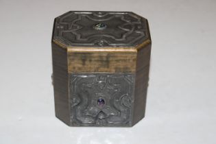 An Arts & Crafts type tea caddy with stylised pewter decoration