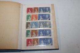 A stock book containing 27 sets of 1937 Coronation