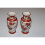 A pair of Japanese Satsuma style vases, marked to