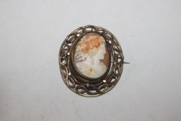 A large Victorian swivel cameo brooch