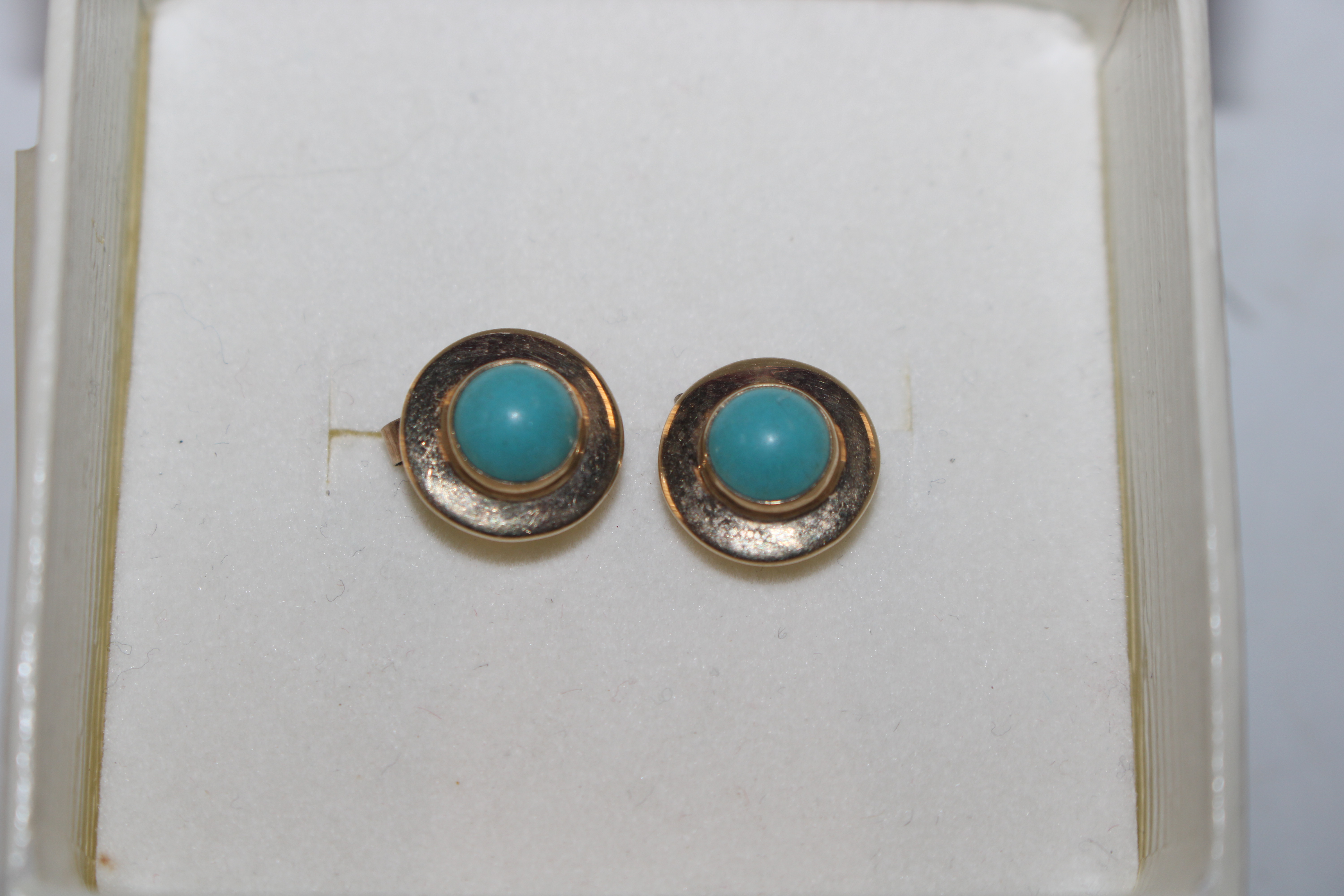 A pair of 9ct gold Hallmarked turquoise target ear