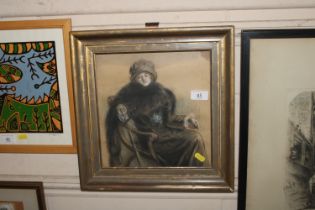 A gilt framed pastel study depicting lady seated i