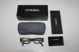 A boxed pair of Chanel glasses with case