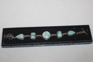 A turquoise coloured and silver bracelet
