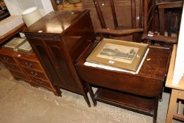 A mahogany record cabinet and an oak drop leaf tea