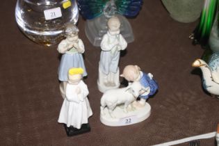 A Royal Doulton figurine "Bedtime" HN 1978; a porc