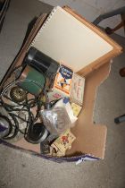 A box of assorted old radio parts, ear-phones etc.