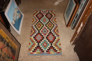 An approx. 4'9" x 2' Chobi Kelim runner