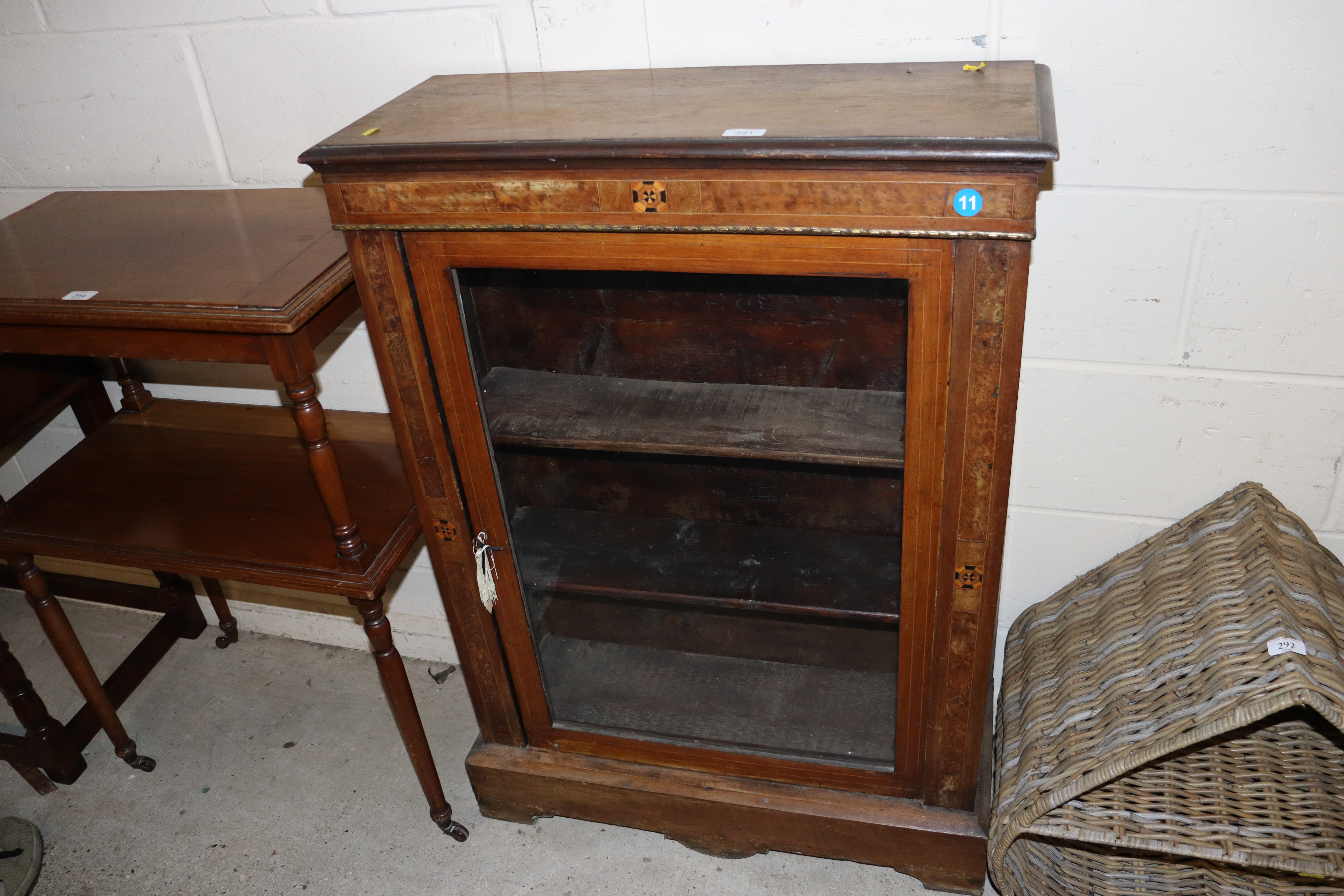 A late Victorian walnut pier cabinet with bur wood and box strung inlay