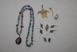 A large Sterling silver shell necklace with aquama