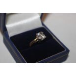 A 925 silver gilt ring set with cubic zirconia