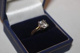 A 925 silver gilt ring set with cubic zirconia