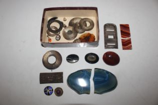 A box containing silver, white metal and enamel decorated items, agate etc.