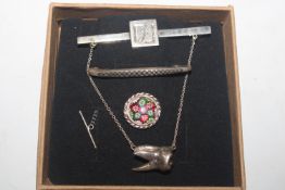 A Hallmarked Sterling silver and Millefiori tie pi