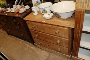 A stripped pine chest fitted three long drawers