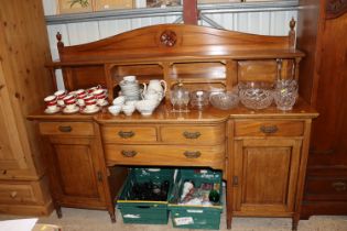 An Edwardian sideboard fitted two short over one l