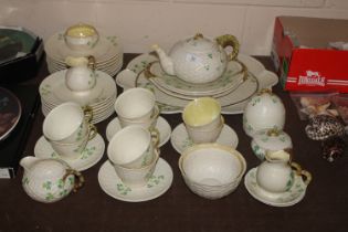 A collection of Belleek basket ware "Shamrock" din