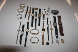 A box of assorted wrist watches and parts