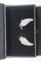 A pair of silver and mother of pearl ear-rings