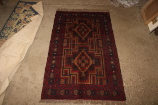 An approx. 4'3" x 2'8" Bolochi rug