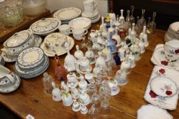 A quantity of various china and glass bells