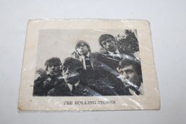 A Rolling Stone promo card bearing facsimile signatures to the reverse