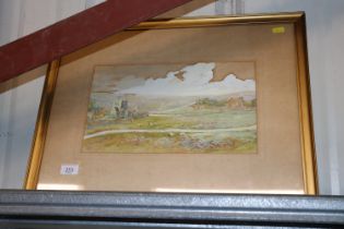A gilt framed and glazed landscape study signed to