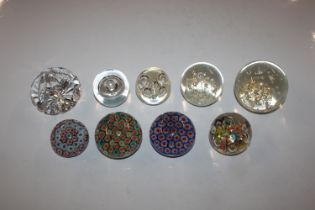 Nine various glass paperweights