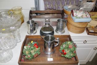 A wooden tray, a book trough, a desk magnifying gl