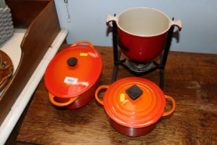 A quantity of Le Creuset style cooking ware