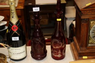 Two ruby flash glass decanters and stoppers