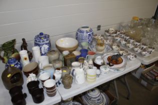 A collection of floral decorated teaware, blue and