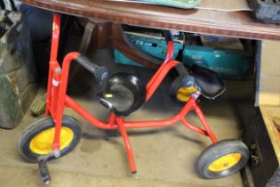 A child's two seater tricycle