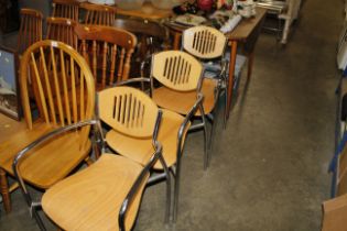 Three metal framed chairs